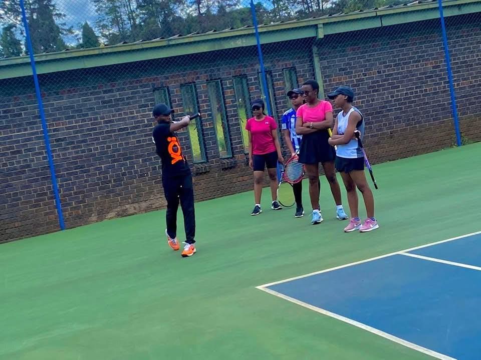 Players warming up before match