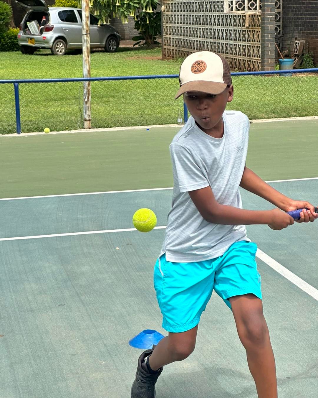 Young player perfecting their technique